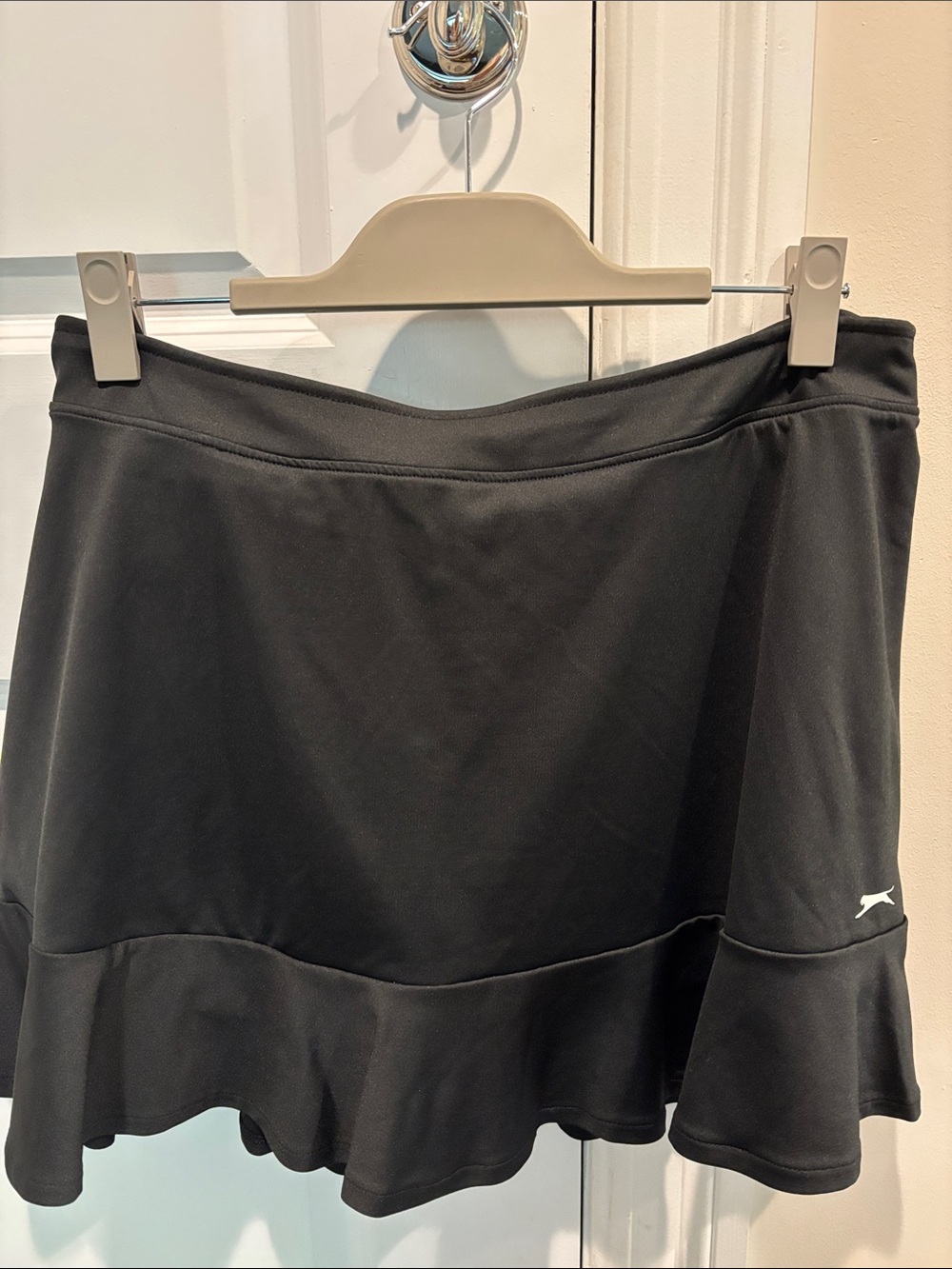 Slazenger Women’s Black Golf Skort with Ruffle Hem.